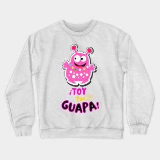 I'm pretty! Funny pink Martian with the funny phrase in Spanish: ¡Toy toa guapa!. Popular expression in Spanish. Crewneck Sweatshirt